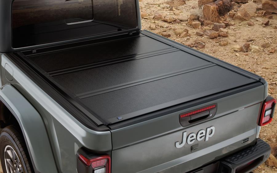 2021 Jeep Gladiator The Hard Tri-Fold Tonneau Cover is lightweight andmade with a durable 2021 Jeep Gladiator Tri Fold Tonneau Cover